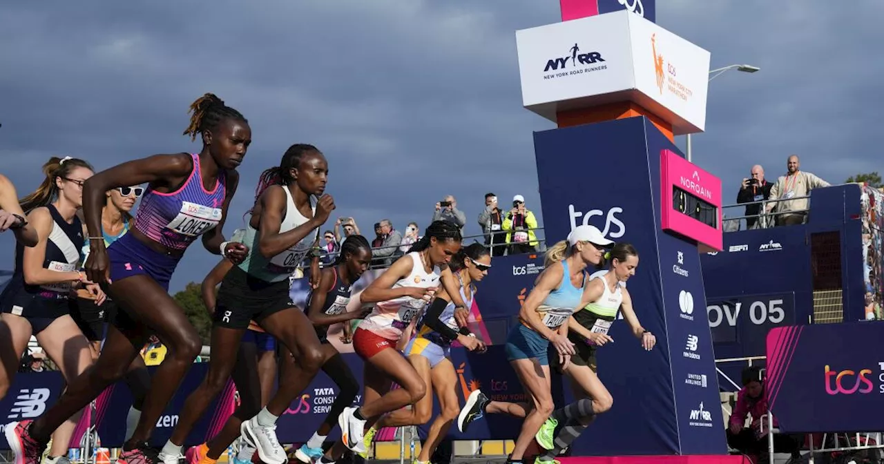 Tola sets NYC Marathon course record to win men's race; Hellen Obiri of Kenya takes women's title