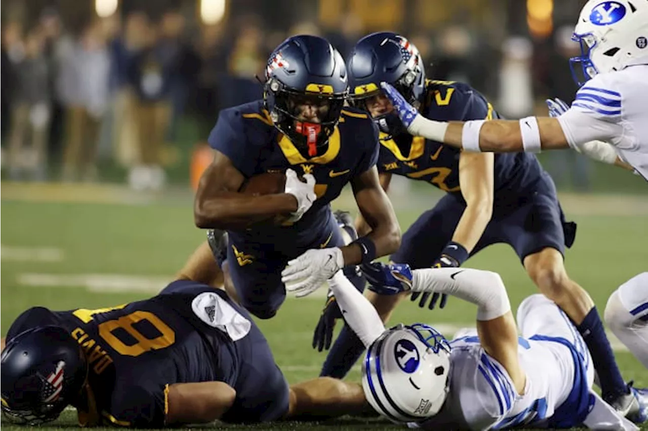 West Virginia gets strong rushing efforts from Jahiem White and CJ Donaldson in a 37-7 win over BYU