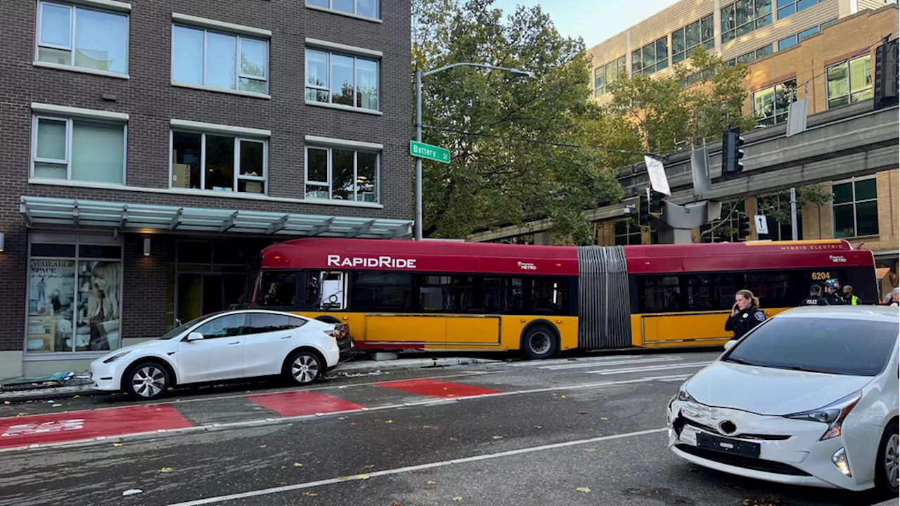 Woman dead, man in critical condition after Metro bus crashes into building in Seattle