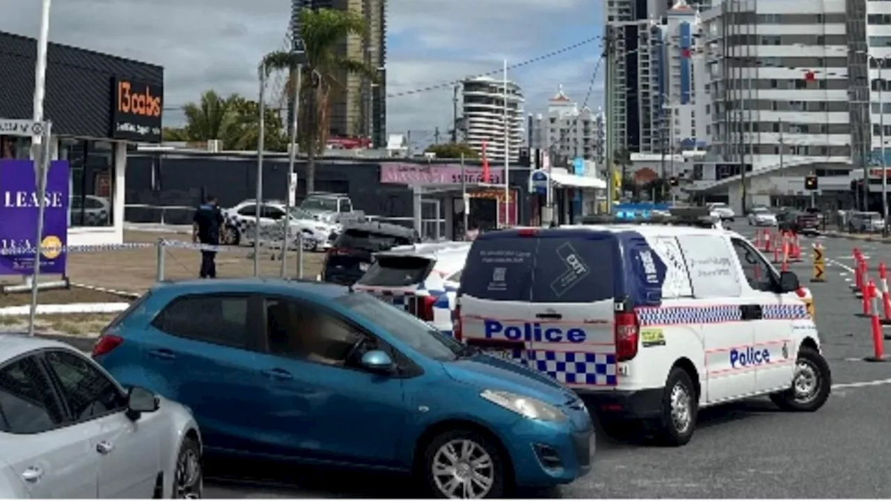 Man ‘slumped’ in car parked at Mermaid Beach allegedly pulls gun on police