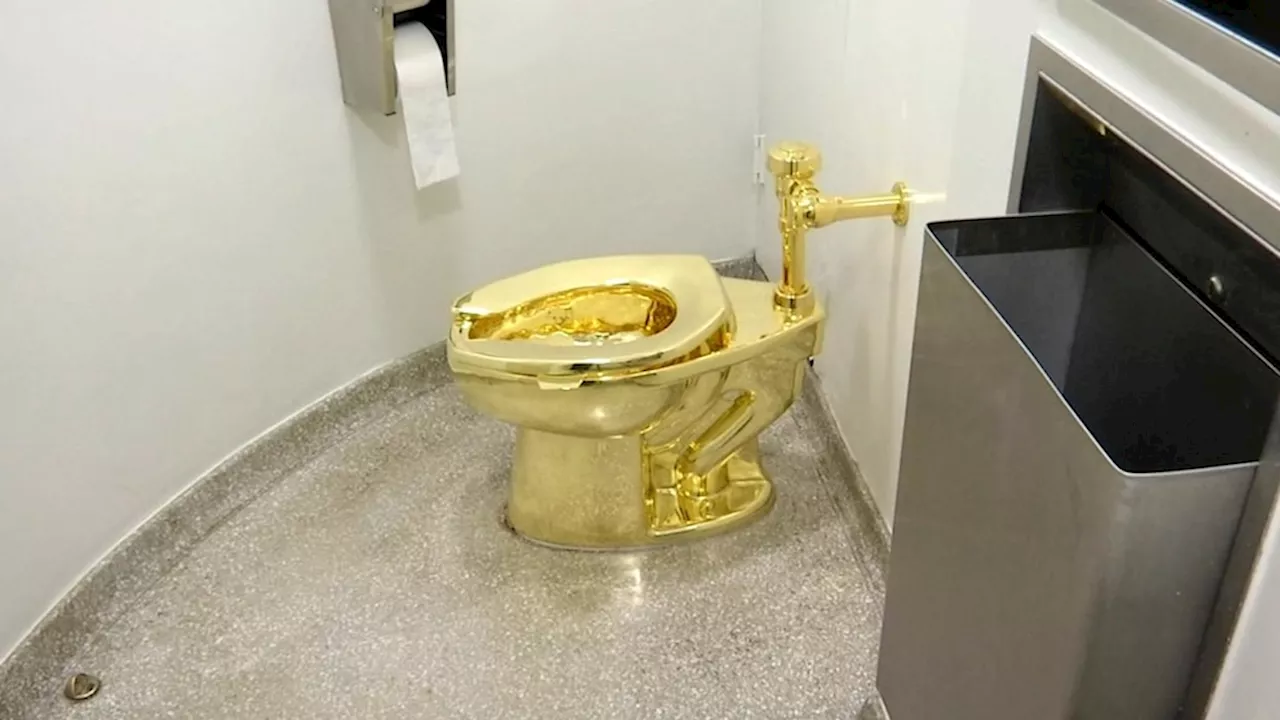 4 men charged in theft of golden toilet from Churchill's birthplace