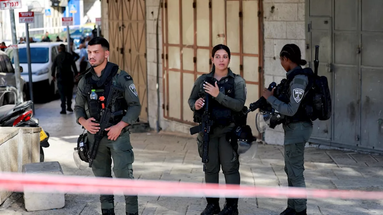 Israel-Gaza war live: Israeli soldier stabbed in east Jerusalem attack as forces encircle Gaza City