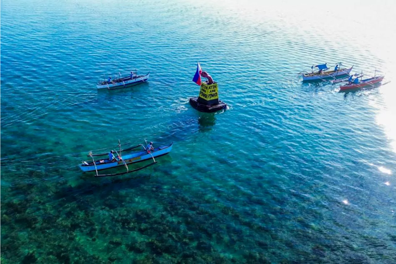 Fishermen set symbolic buoy afloat in West PH Sea