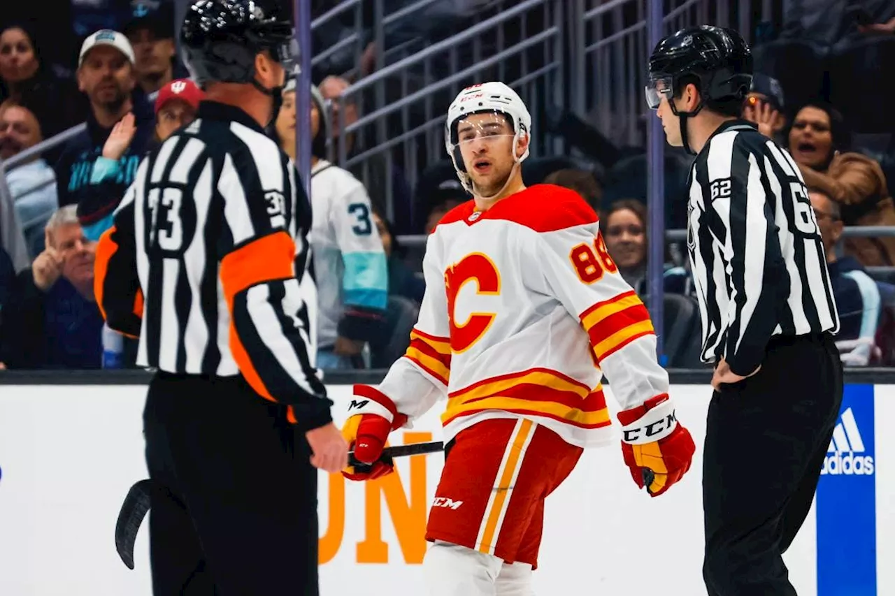 Calgary Flames’ Andrew Mangiapane suspended one game cross-checking Kraken’s Jared McCann