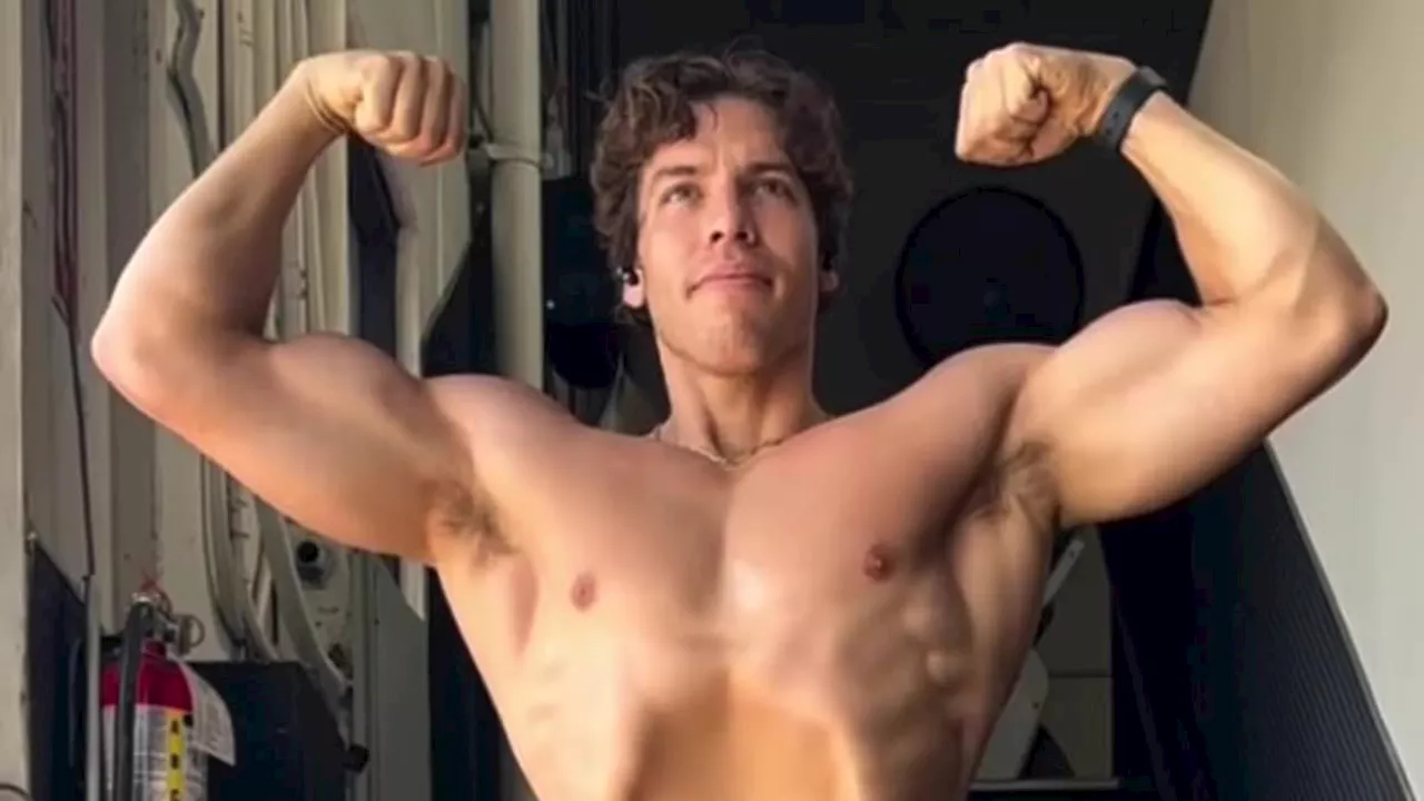 Arnold Schwarzenegger's son Joseph Baena shows off his muscles just like his father did as a...