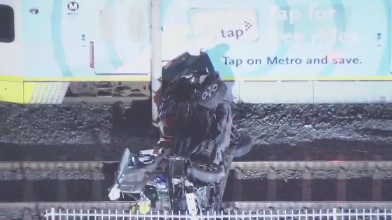 Car hit by Blue Line train in South Los Angeles, 1 injured