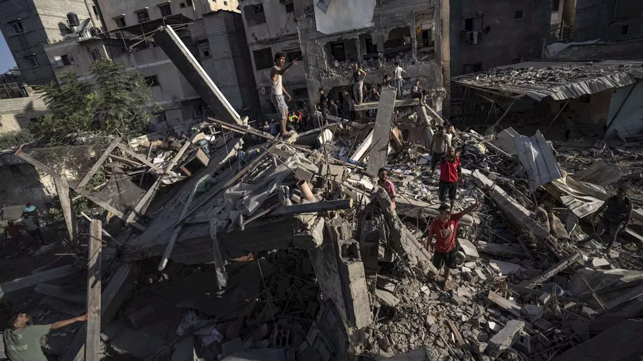 Gaza has lost telecom contact again, while Israel's military announces it has surrounded Gaza