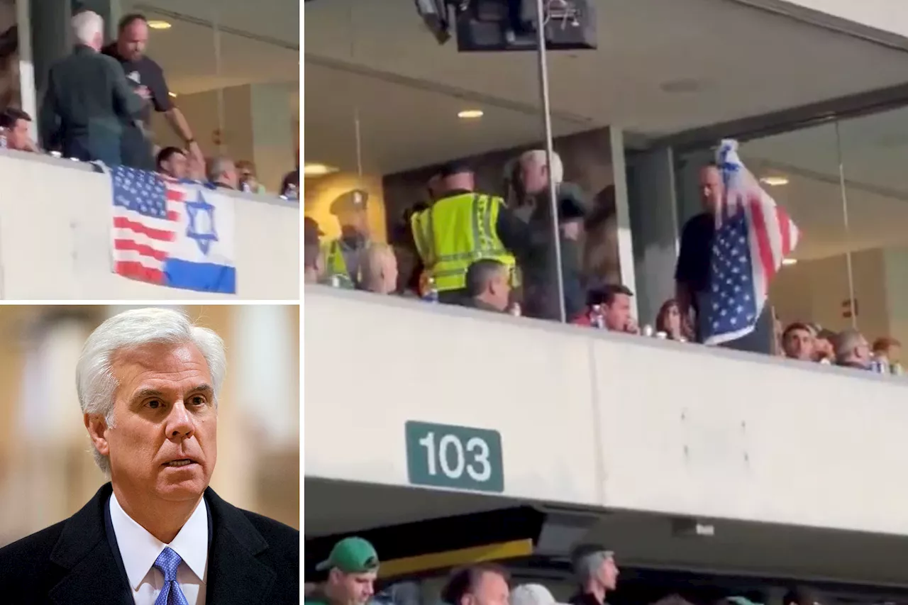 New Jersey political boss is kicked out of football suite after draping Israel flag