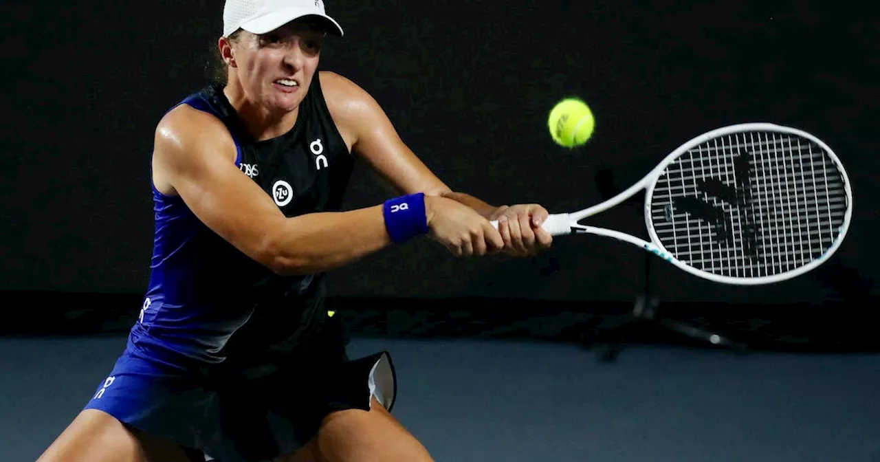 Tennis-Swiatek swats aside rival Sabalenka to reach WTA Finals title match