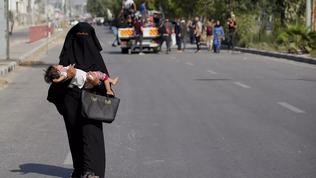 Civilians fleeing northern Gaza's combat zone report a terrifying journey on foot past Israeli tanks