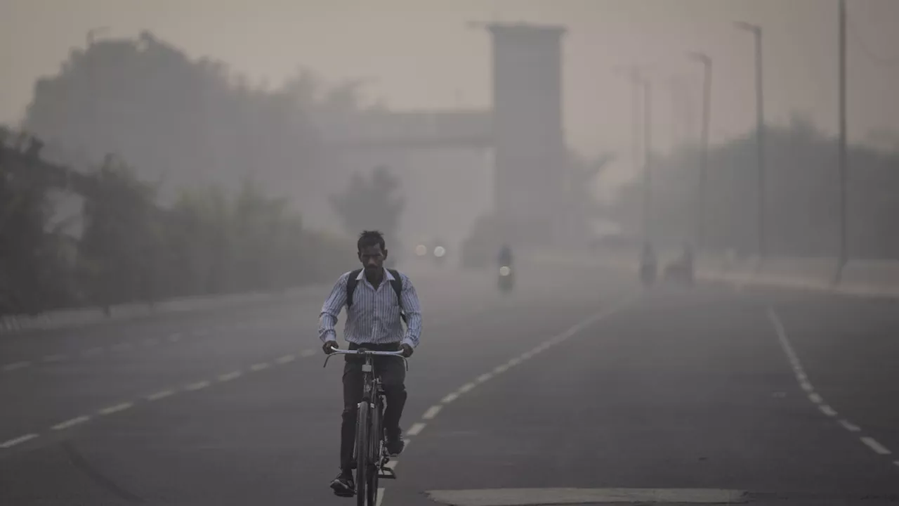 Masks are back, construction banned and schools shut as toxic air engulfs New Delhi