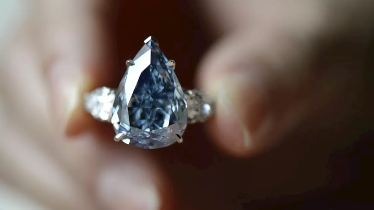 Blue diamond sells for more than US$44 million at Christie's auction in Geneva