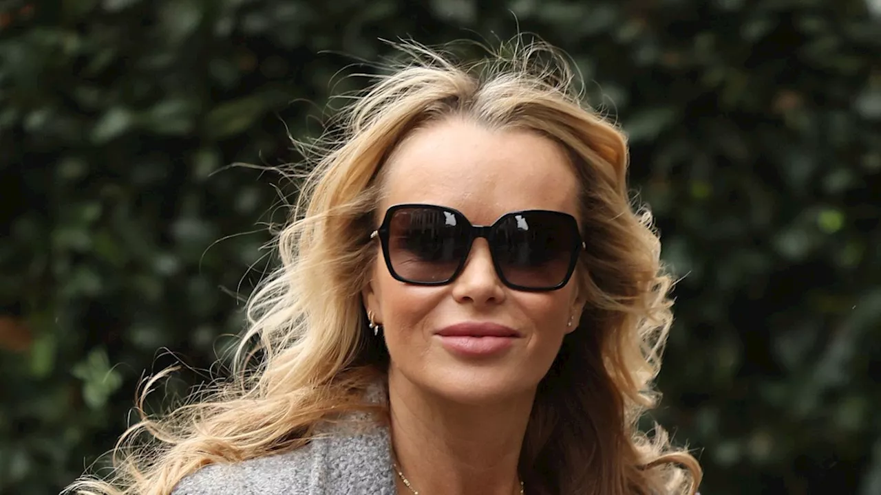 Amanda Holden wows in slinky tan dress and leather knee-high boots