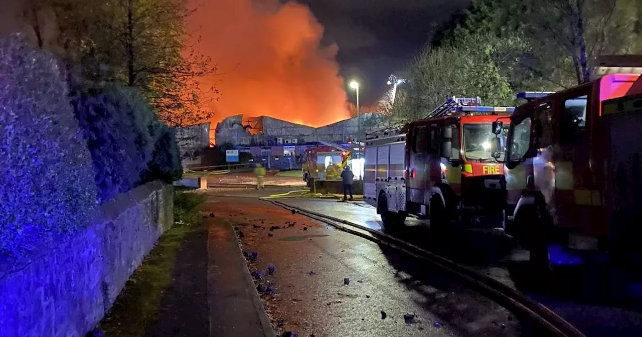 Huge inferno breaks outs at cheese business as 50 firefighters fight flames