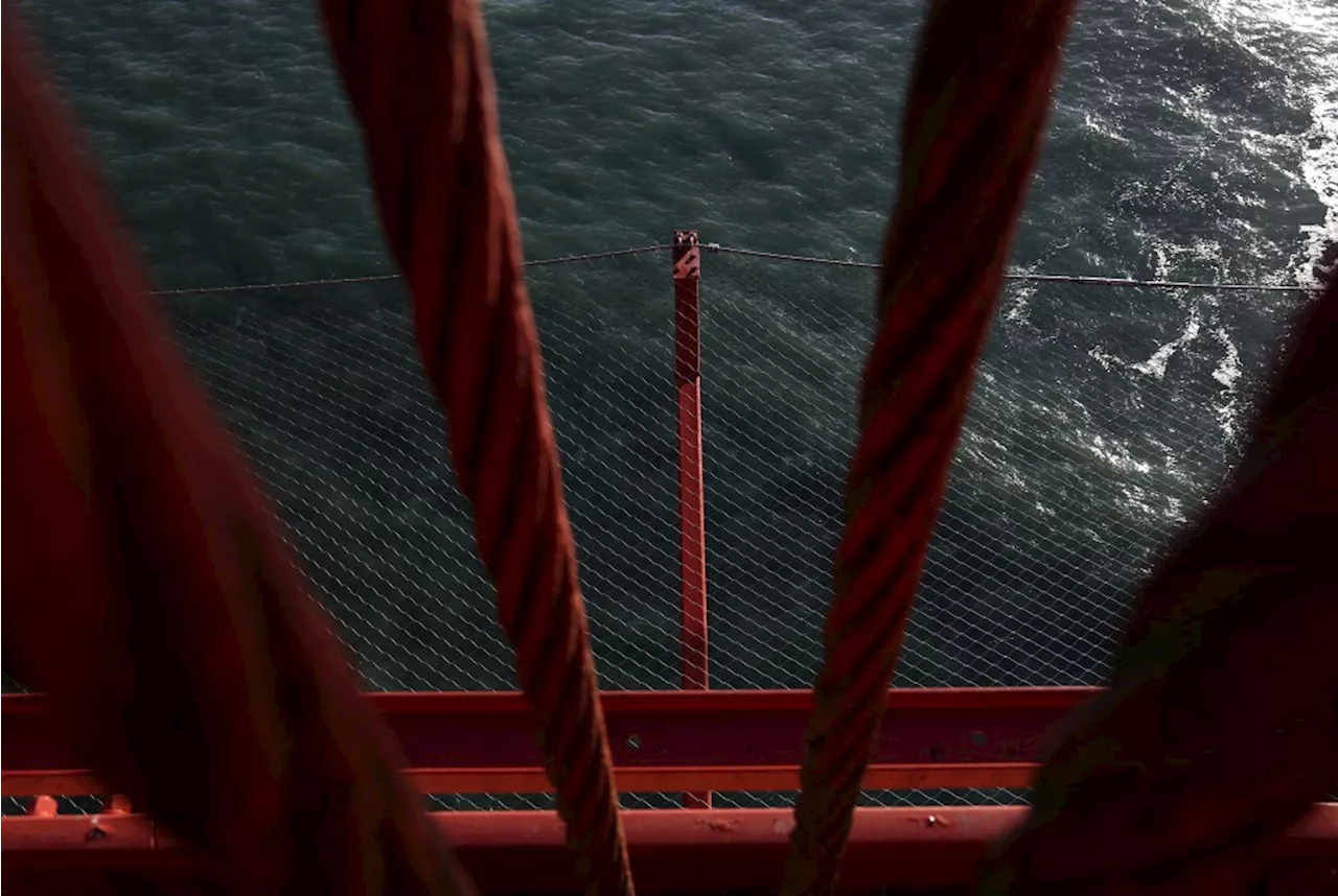 Photos: Golden Gate Bridge suicide-deterring net nears completion