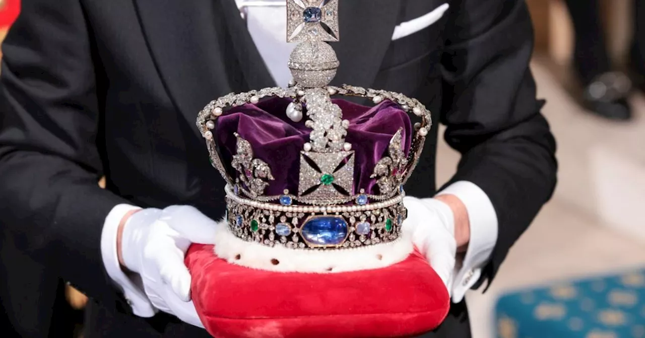 Why is the King's crown in Parliament and how much is it worth?