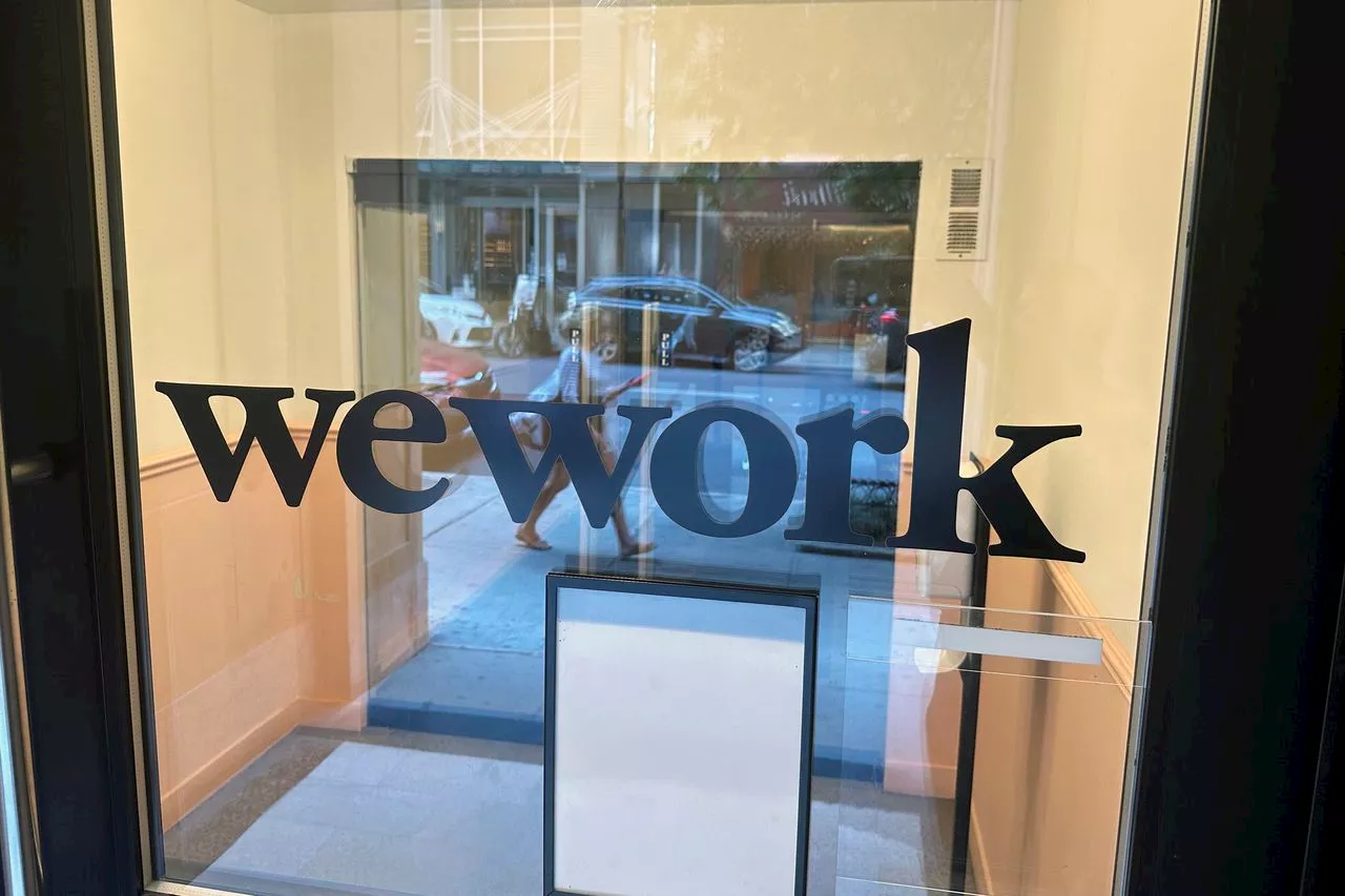 Once valued at $47B, office-sharing company WeWork files for bankruptcy