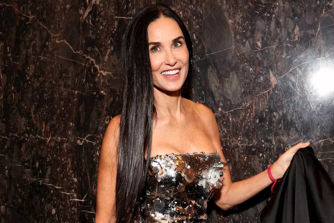 Demi Moore Dazzles in Silver Strapless Dress at 2023 CFDA Awards