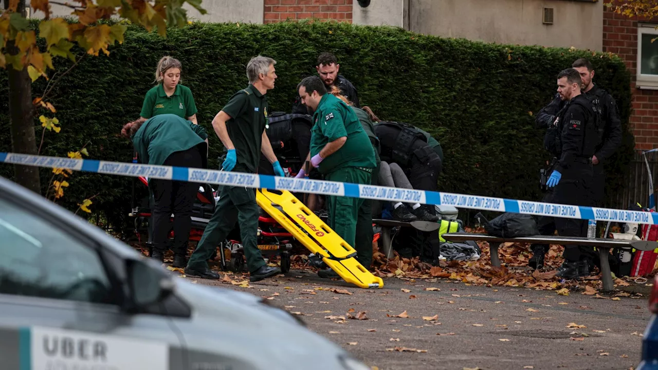 Two teens stabbed in horror attack outside Manchester College as cops hunt for knifeman...