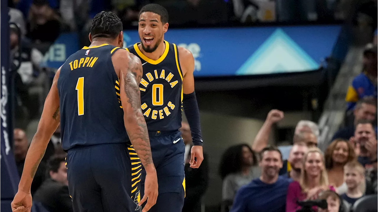 Pacers rout Spurs to give Carlisle 900th win