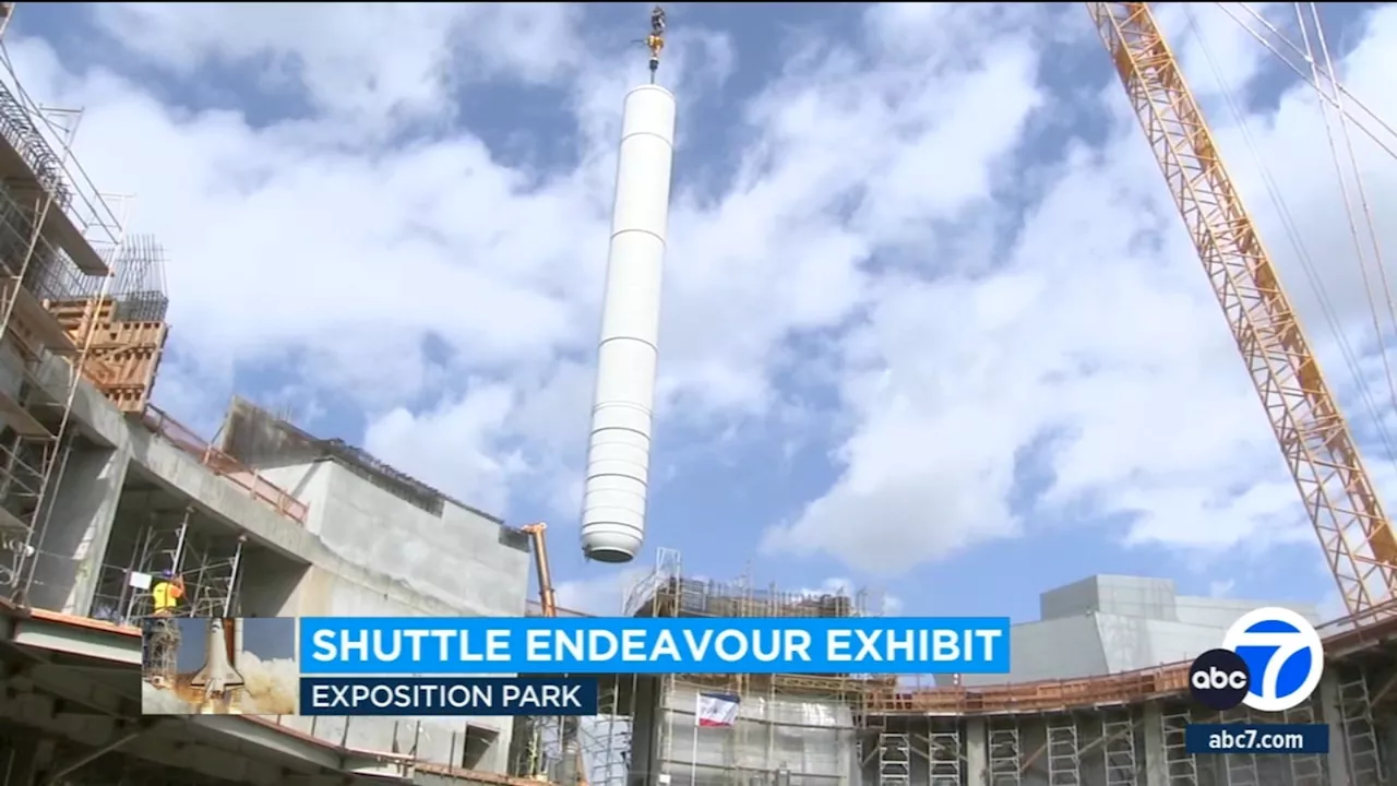 Space Shuttle Endeavour's rockets moved into place to prepare for permanent exhibit