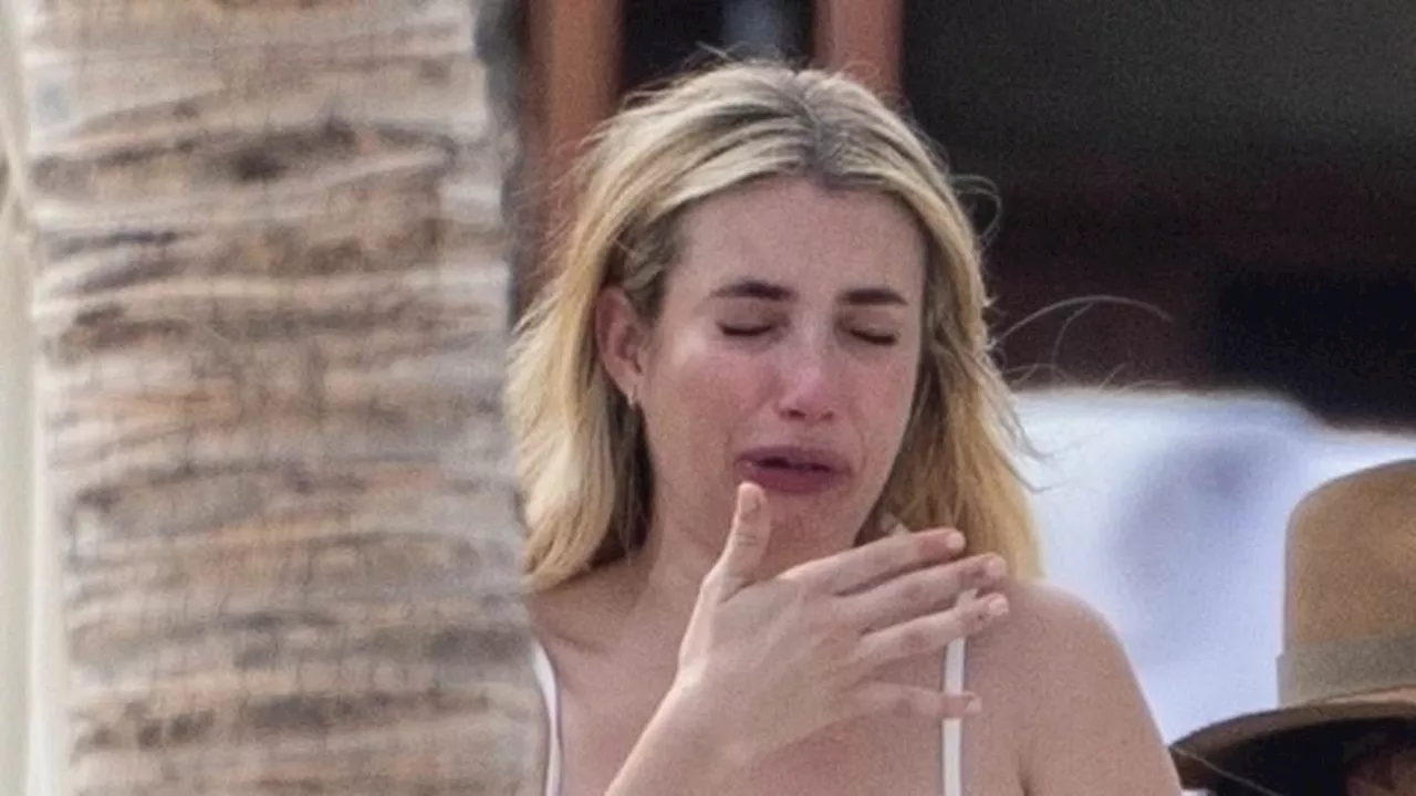 EXCLUSIVE: Emma Roberts scrunches up her face after trying a VERY strong tasting beverage on holiday...