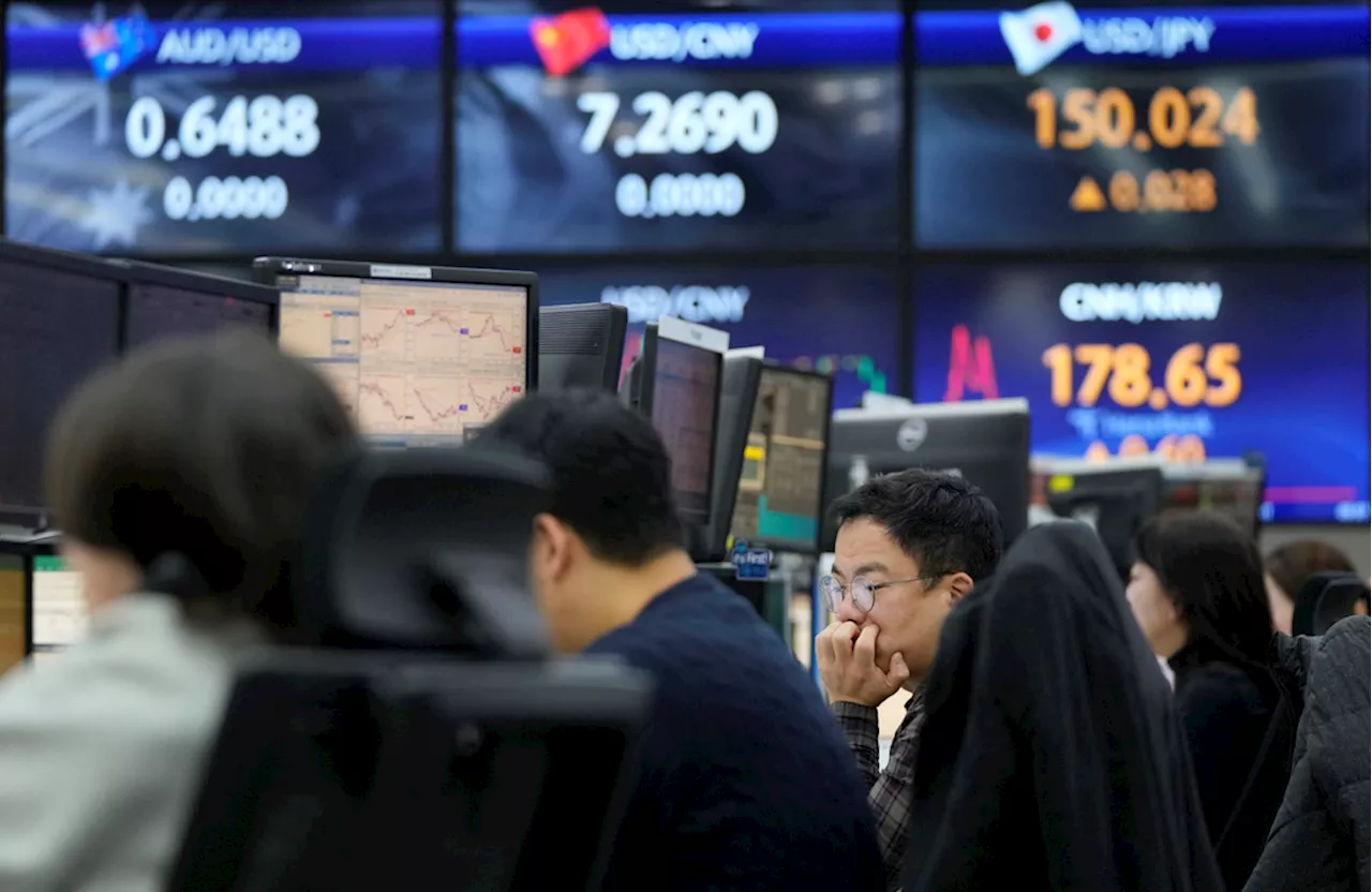 Asian markets drift as traders weigh outlook for US rates