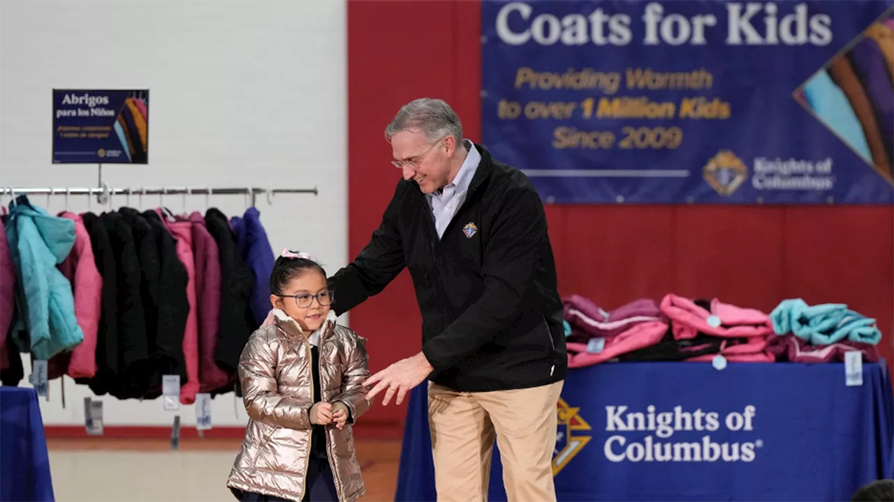 Knights of Columbus distributes its one millionth coat to deserving student in Denver