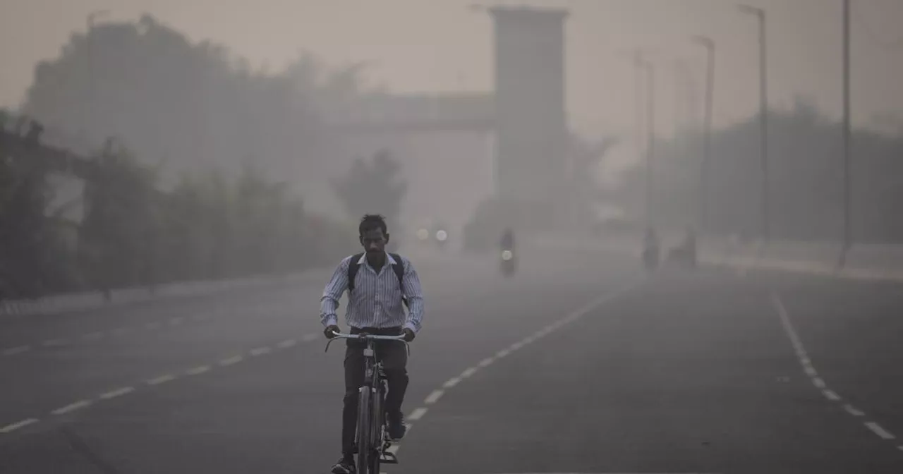 Toxic air engulfs New Delhi, closing schools, halting work and bringing out the masks