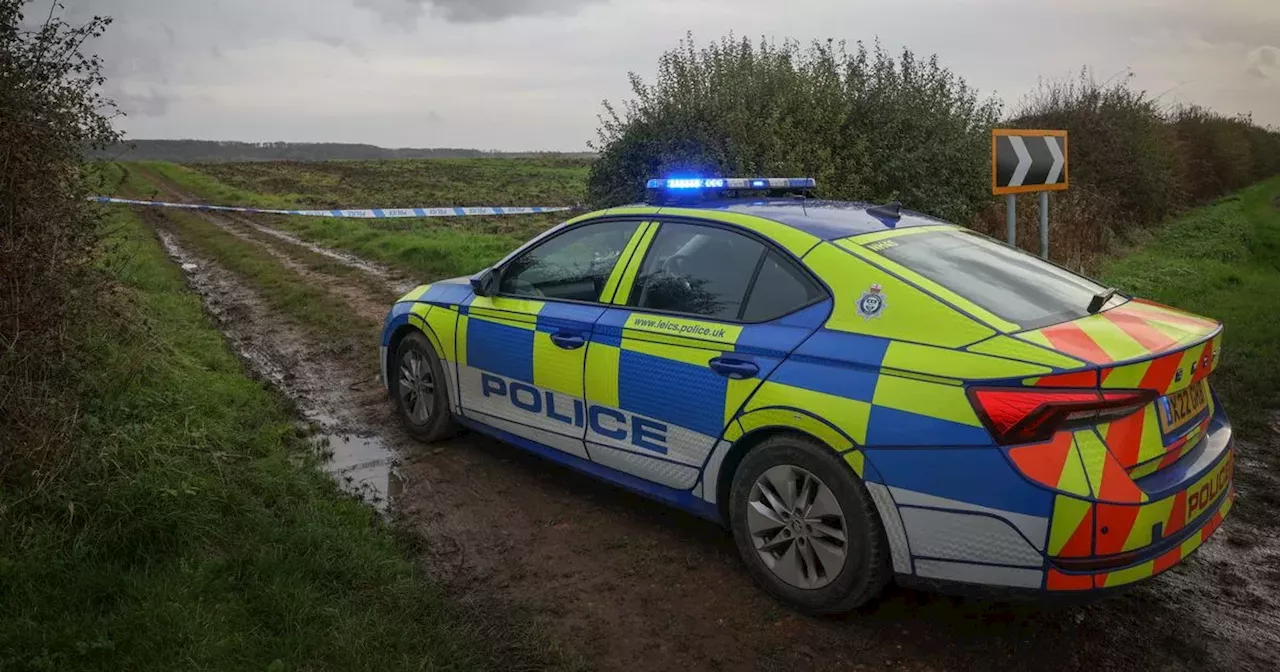 Major police cordon surrounds village field after man's body found