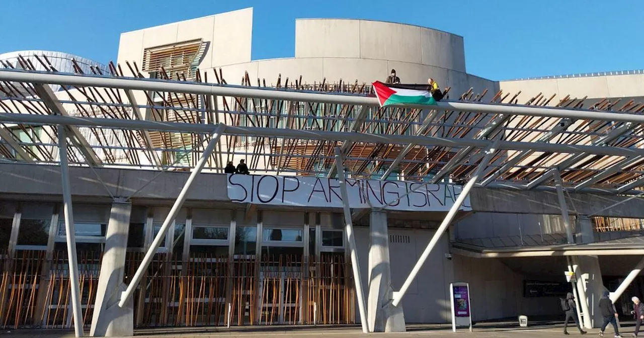 Police lock down Holyrood after pro-Palestine protesters scale roof