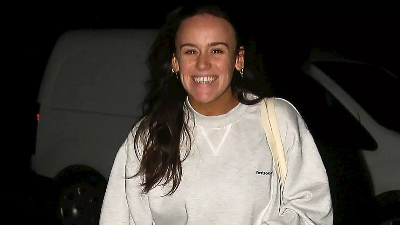 Strictly's Ellie Leach and Vito Coppola can't stop smiling as they depart rehearsals together after...