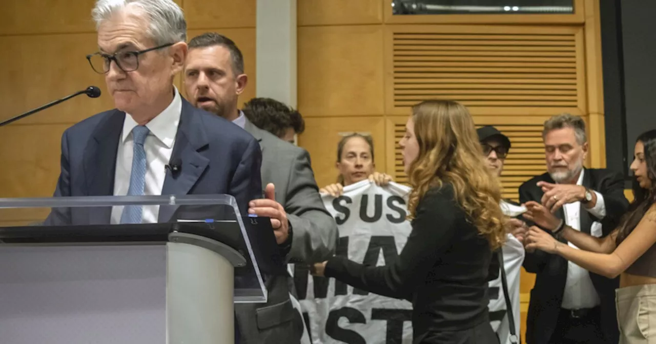 Climate protesters disrupt speech by Fed Chairman Jerome Powell