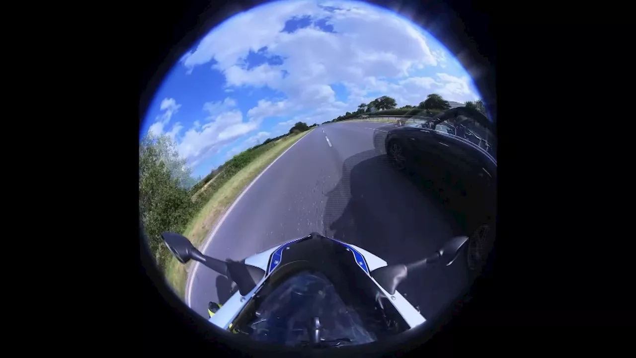 Motorcyclist going 150mph and performing 'wheelies' snared by his own dashcam footage