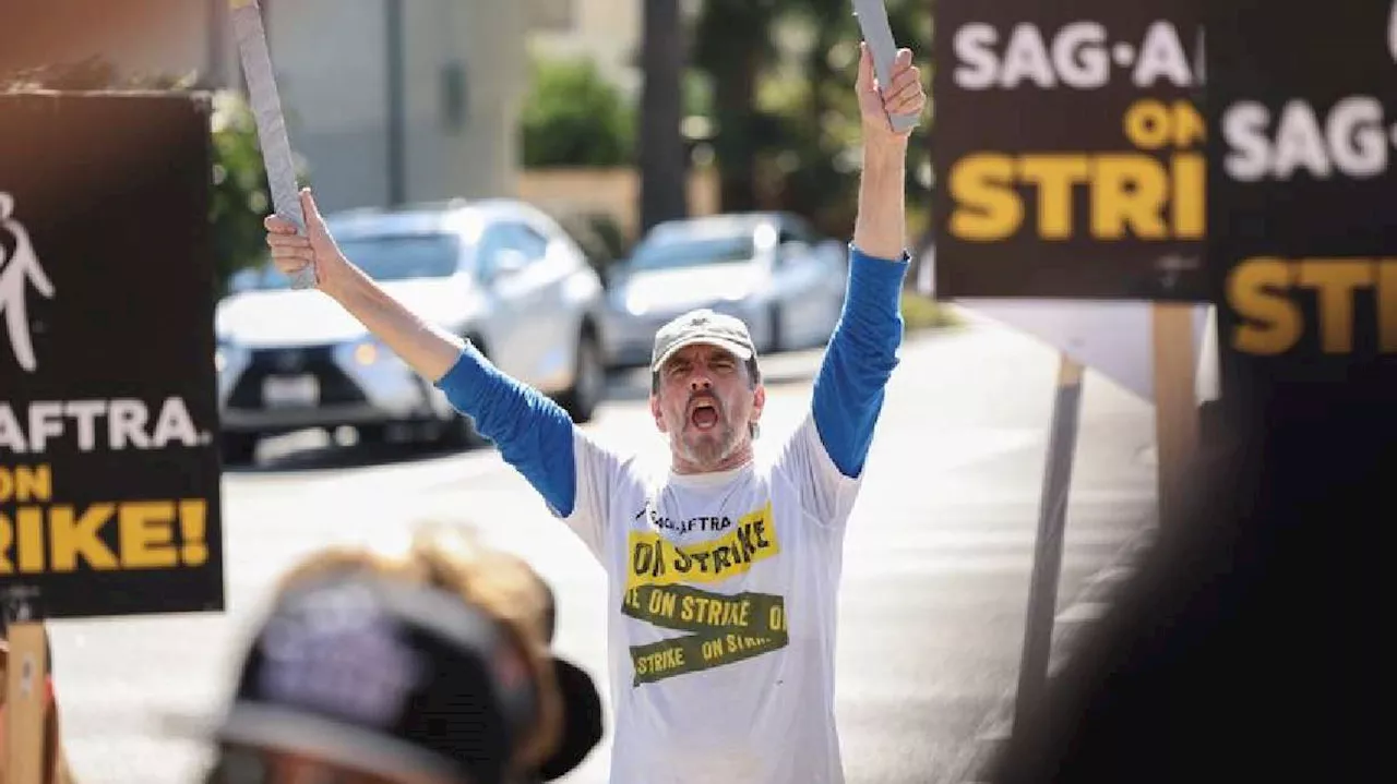 Striking actors reach tentative agreement with Hollywood studios to end strike