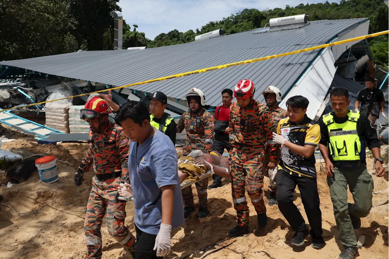 Six workers escape building collapse in Pulau Perhentian, one still missing