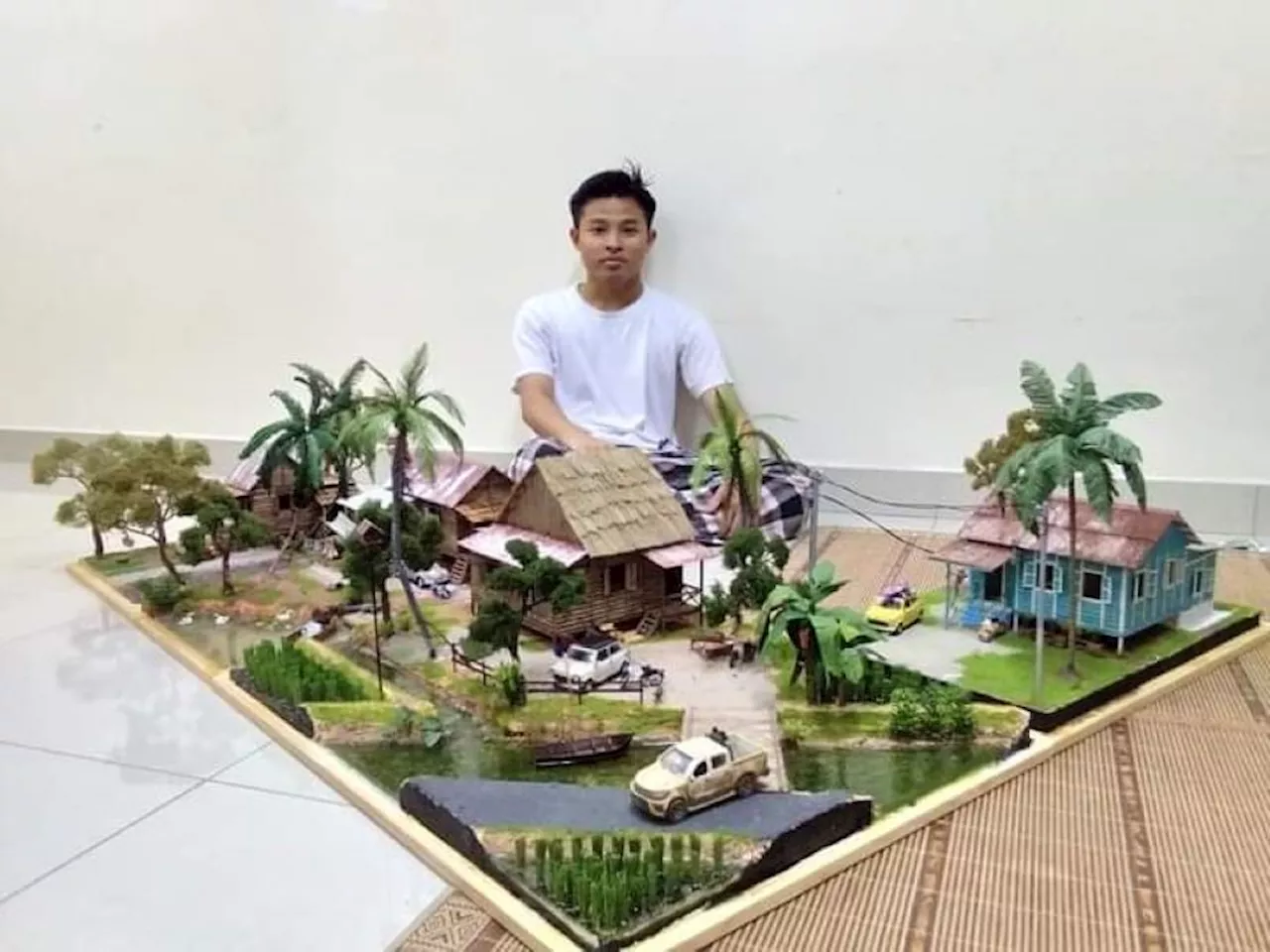 Student Builds Replica House Using Boxes and Manila Cards