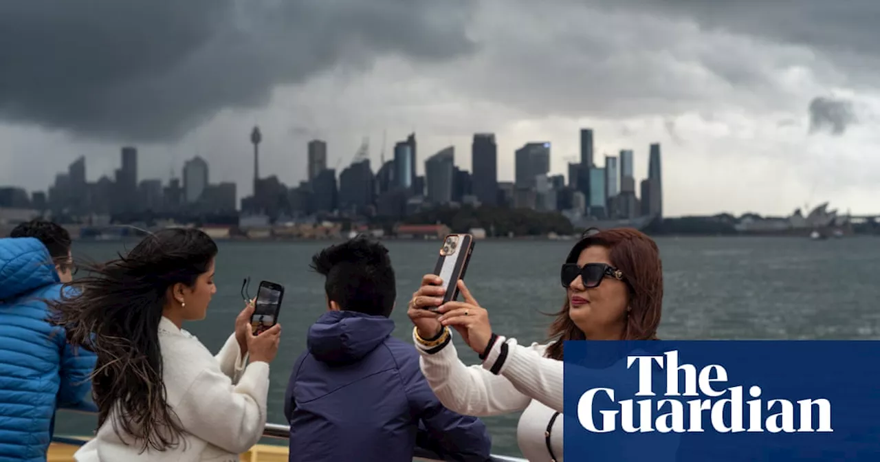 Storms along Australia’s east coast may lead to flash flooding, two women reported missing