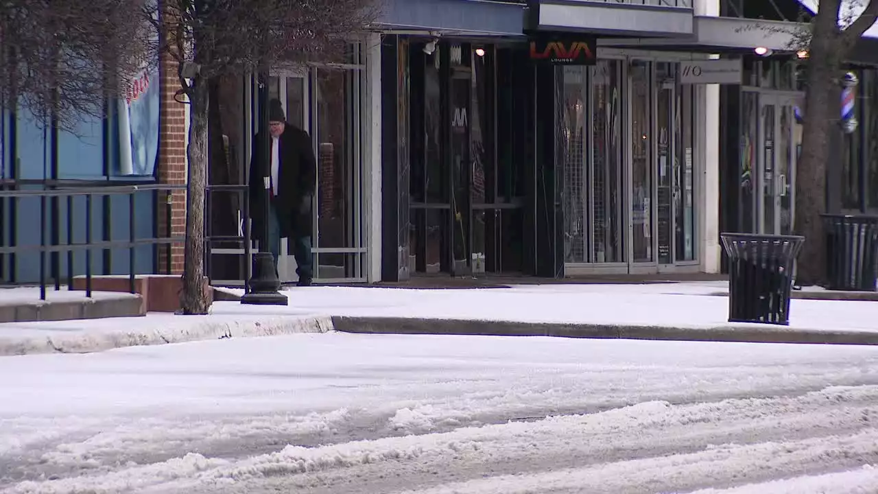 Icy Dallas streets shut down normally busy strip centers