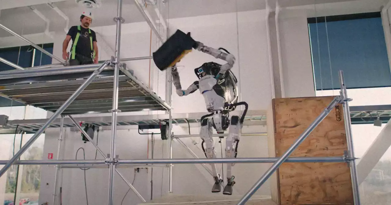 Watch a Boston Dynamics Robot Deftly Toss a Bag of Tools to a Construction Worker