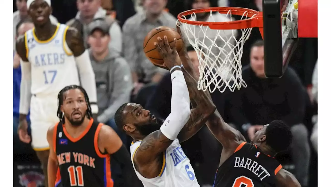 LeBron James has triple-double as Lakers outlast Knicks in OT