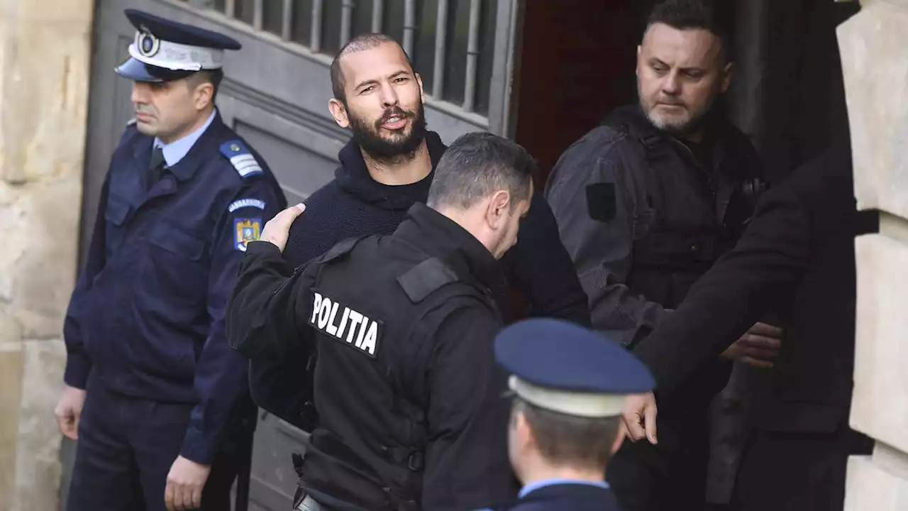 Andrew Tate shouts 'You know I'm innocent' as he arrives at Romanian court with his brother to appeal detention