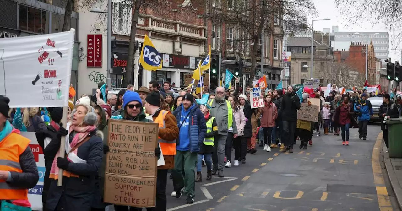 Disruption as around 1,000 striking workers march through city