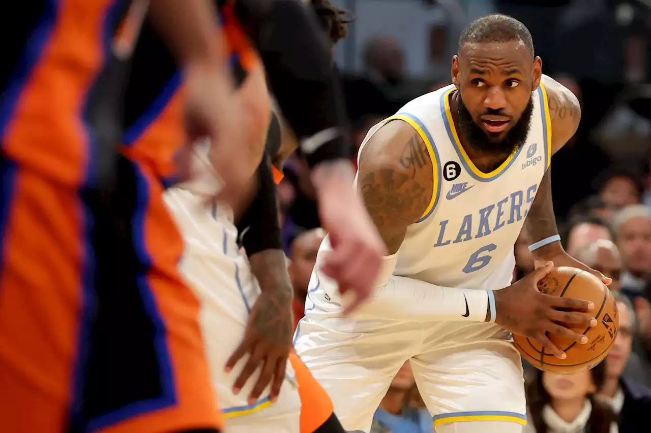 LeBron James' triple-double sends Lakers past Knicks in overtime