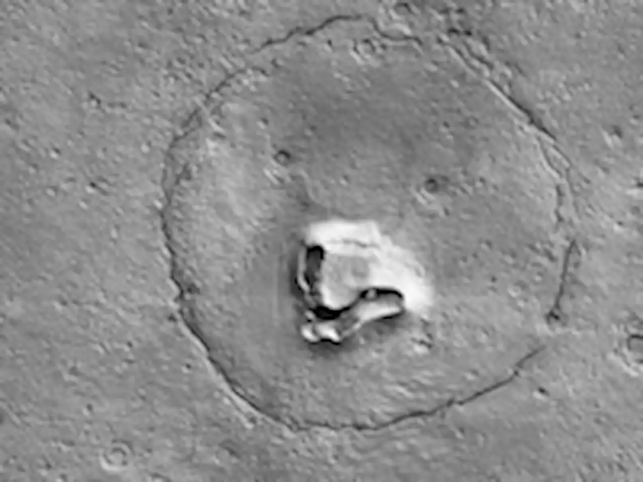 A bear’s face on Mars? NASA captures unusual features on planet’s surface.