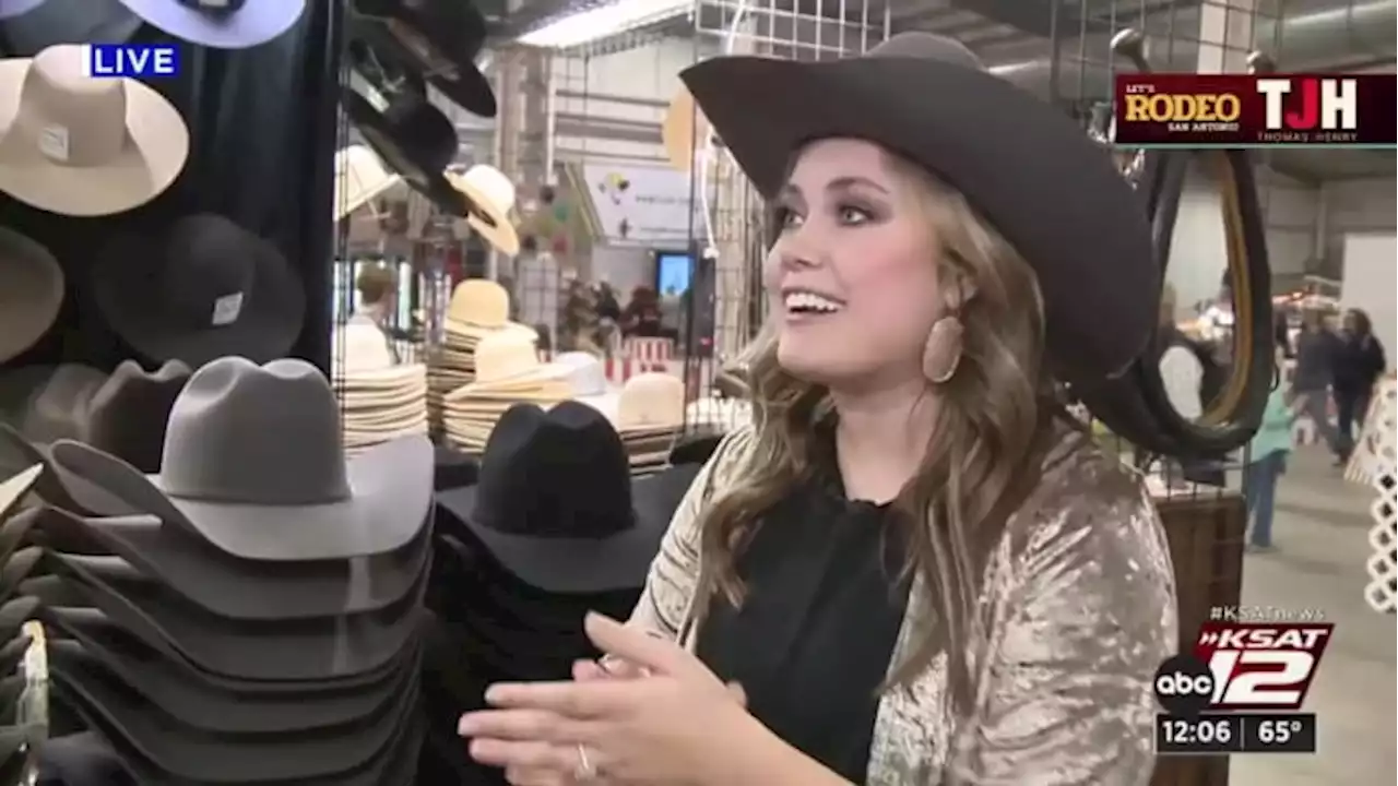 KSAT meteorologist Mia Montgomery shops for a cowboy hat at the Stock Show & Rodeo