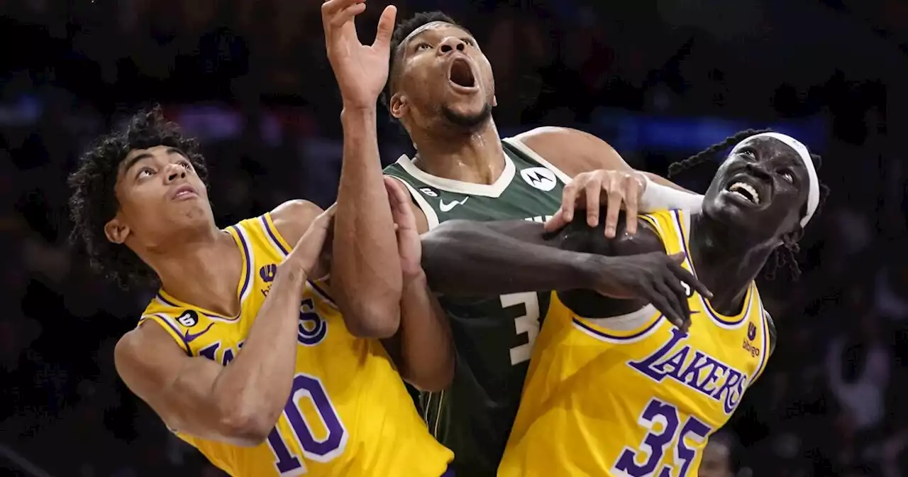 Short-handed Lakers give Bucks a fight but fall short