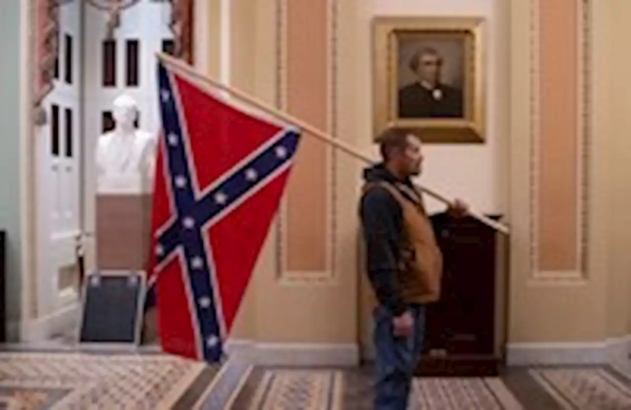 Man carrying Confederate flag through Capitol on Jan. 6 sentenced to 3 years