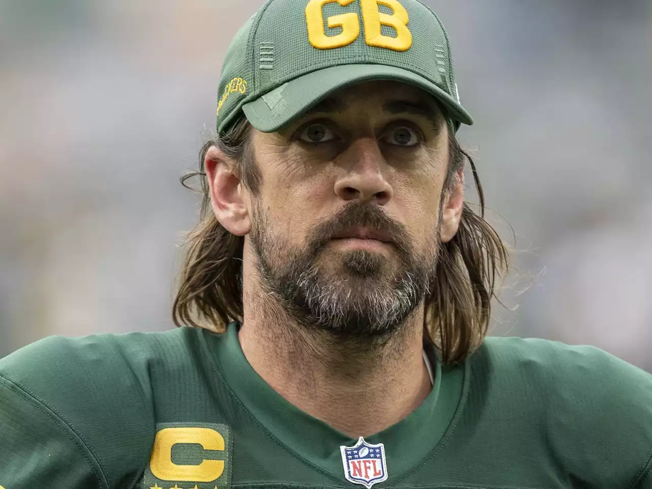 Football star Aaron Rodgers will decide on NFL future after 'darkness retreat'