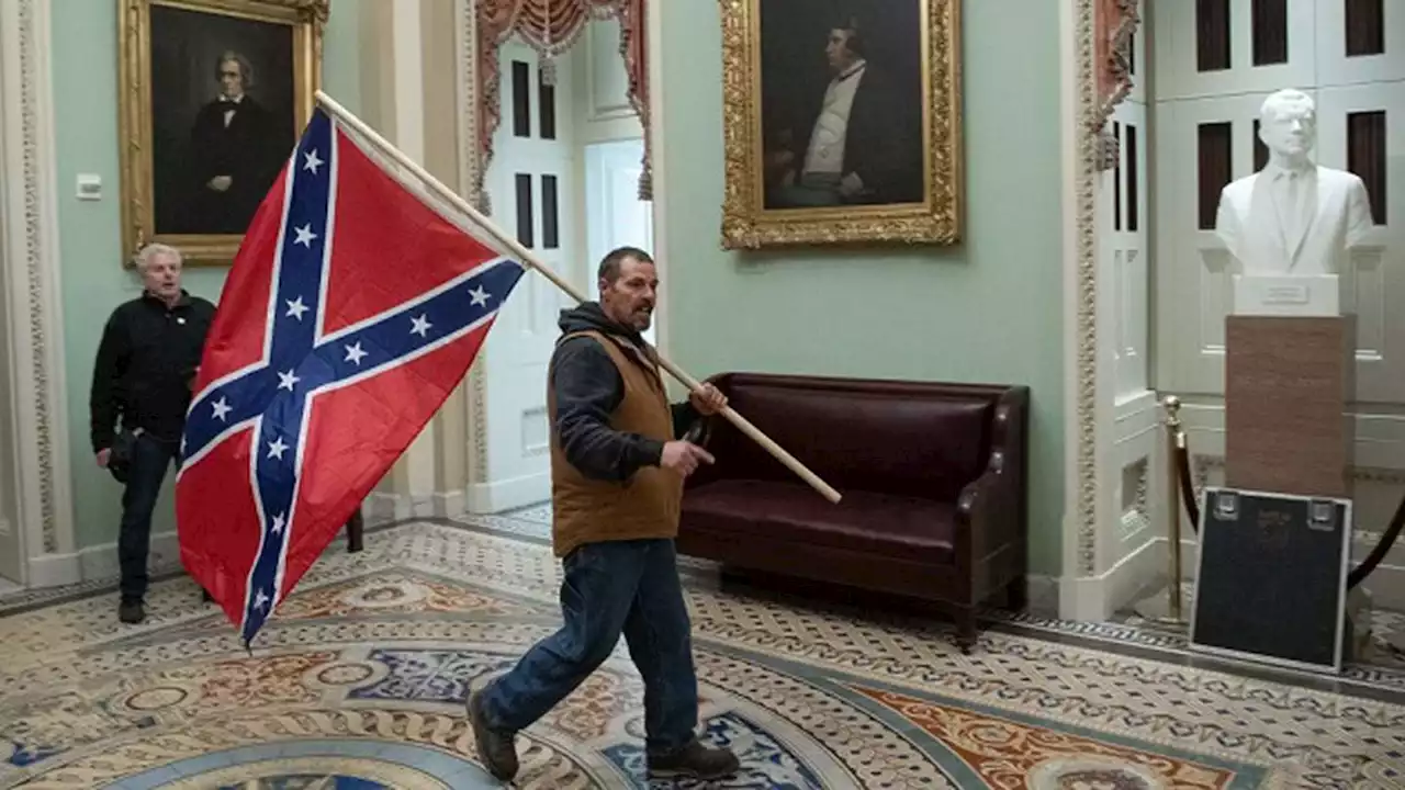 Jan. 6 rioter with Confederate flag inside Capitol sentenced to 3 years